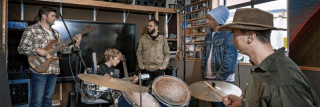 Local musicians Casey Magee, Fraser Browne, Hani Totorewa and Kauri Jackson work with Rohan Evans on his new song.